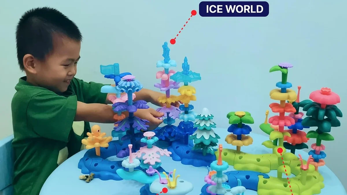 A child playing with combined SUPUZZ ocean and icy world building pieces