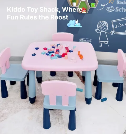 Pink chair beside a toddler activity table, sold separately