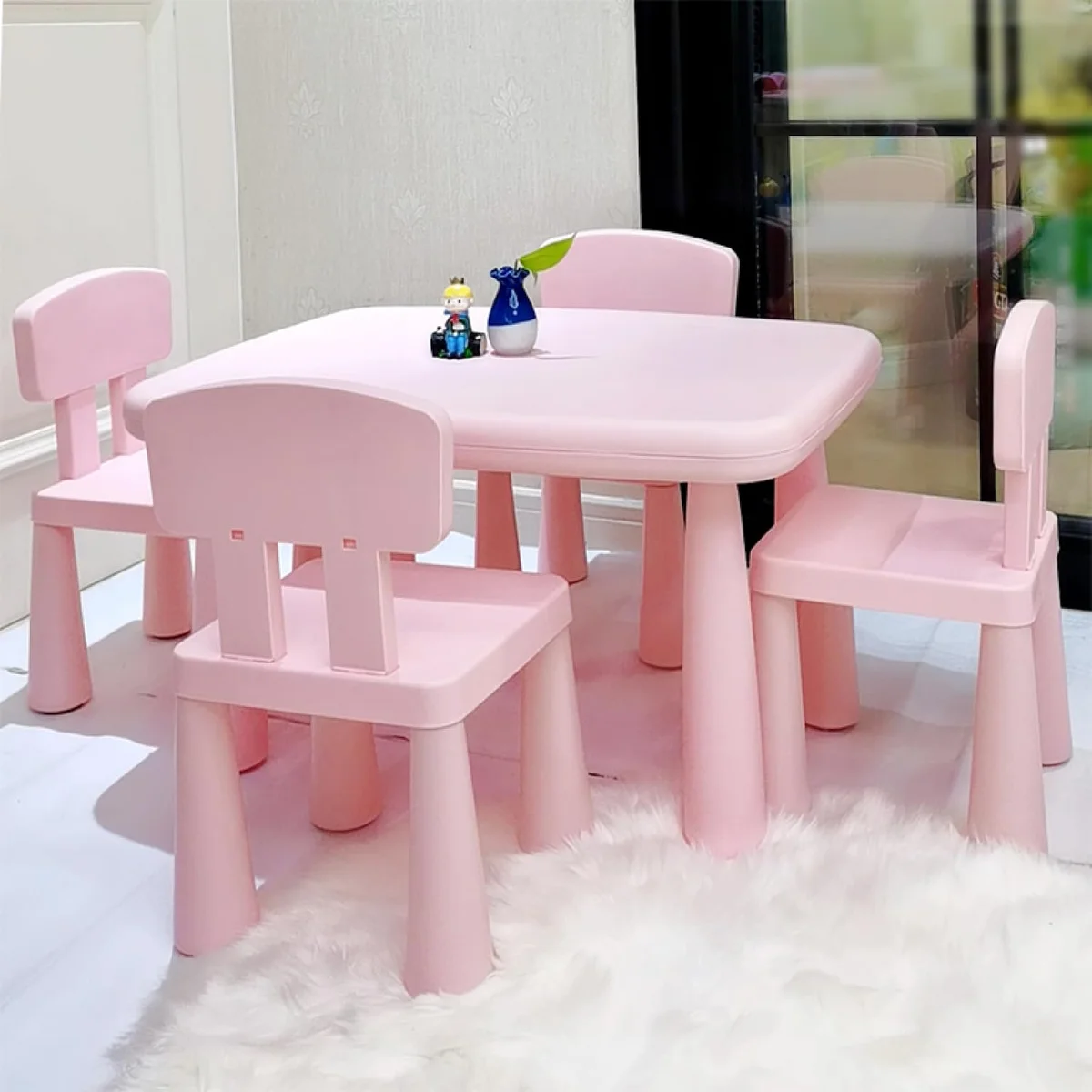 Pink SUPUZZ chairs paired with a matching table, sold separately